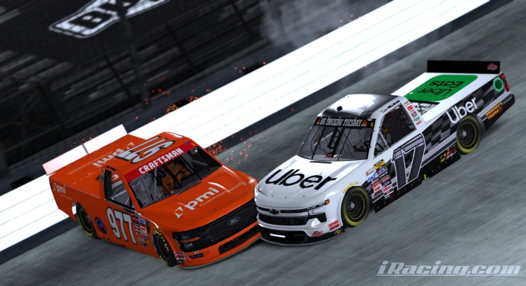 Two racing trucks in close competition on a racetrack, one orange truck labeled '977' and one white truck labeled '17', with sparks flying from the contact between them.